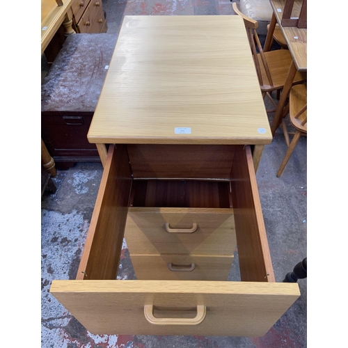 151 - An oak effect three drawer office filing cabinet - approx. 104cm high x 43cm wide x 65cm deep