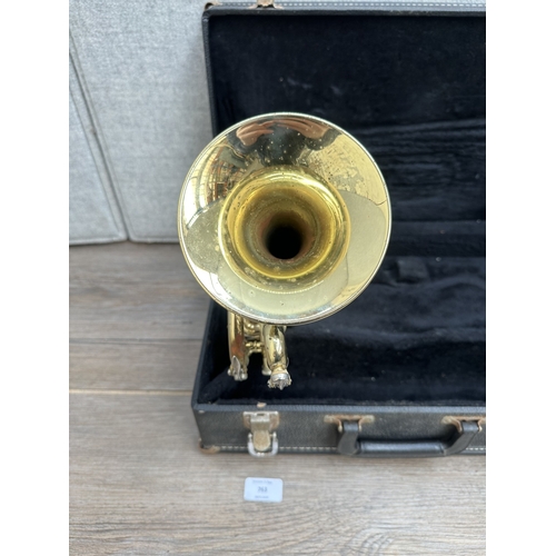 763 - A cased Blessing Scholastic cornet with Blessing 4B mouthpiece