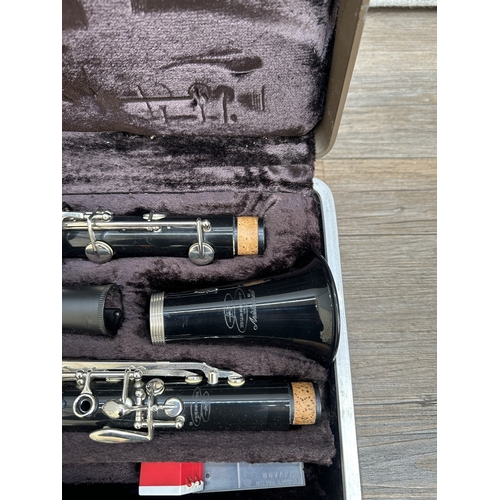 764A - A cased Buescher Aristocrat clarinet