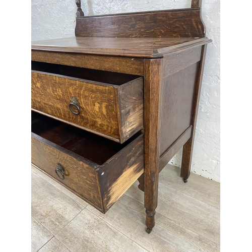 155 - An early 20th century oak dressing chest - approx. 152cm high x 91cm wide x 48cm deep