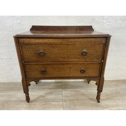 156 - An early 20th century oak chest of drawers - approx. 88cm high x 91cm wide x 48cm deep