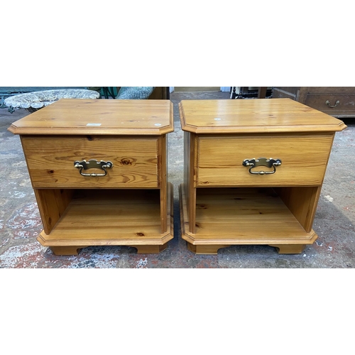 157 - A pair of pine bedside cabinets - approx. 47cm high x 47cm wide x 45cm deep