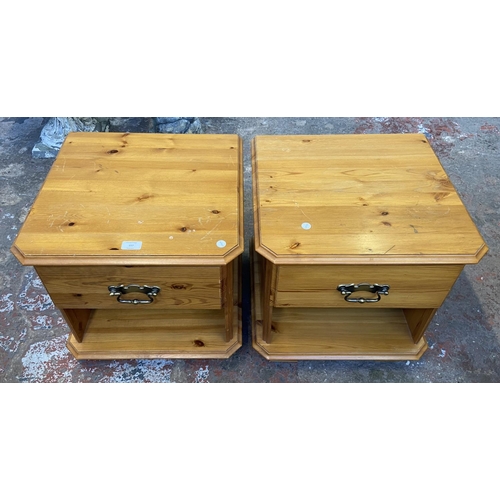 157 - A pair of pine bedside cabinets - approx. 47cm high x 47cm wide x 45cm deep