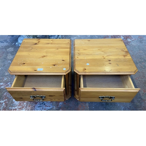 157 - A pair of pine bedside cabinets - approx. 47cm high x 47cm wide x 45cm deep