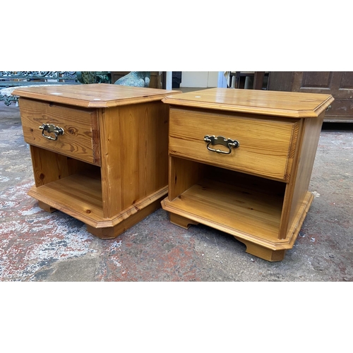 157 - A pair of pine bedside cabinets - approx. 47cm high x 47cm wide x 45cm deep