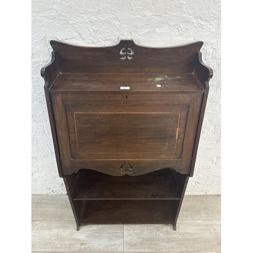 160 - An Arts & Crafts inlaid oak bureau bookcase - approx. 112cm high x 65cm wide x 27cm deep