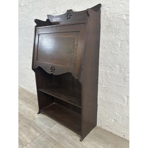 160 - An Arts & Crafts inlaid oak bureau bookcase - approx. 112cm high x 65cm wide x 27cm deep