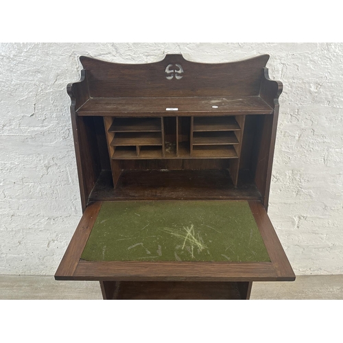 160 - An Arts & Crafts inlaid oak bureau bookcase - approx. 112cm high x 65cm wide x 27cm deep