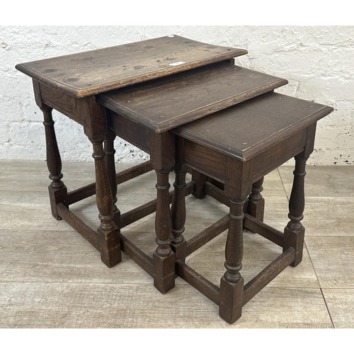 173 - Two pieces of furniture, one 17th century style oak nest of tables and one Edwardian inlaid mahogany... 