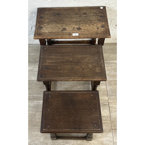 173 - Two pieces of furniture, one 17th century style oak nest of tables and one Edwardian inlaid mahogany... 