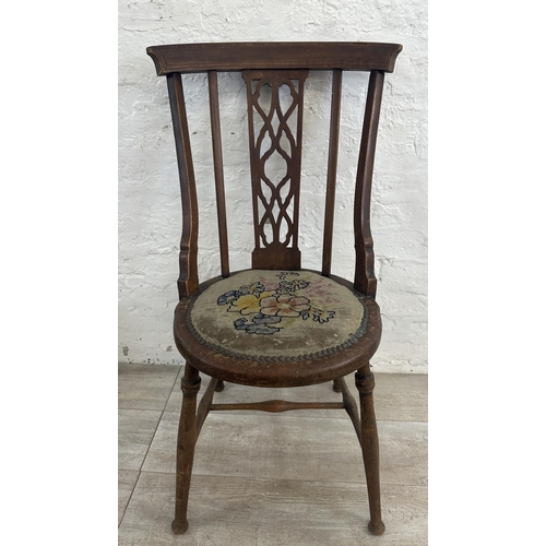 173 - Two pieces of furniture, one 17th century style oak nest of tables and one Edwardian inlaid mahogany... 