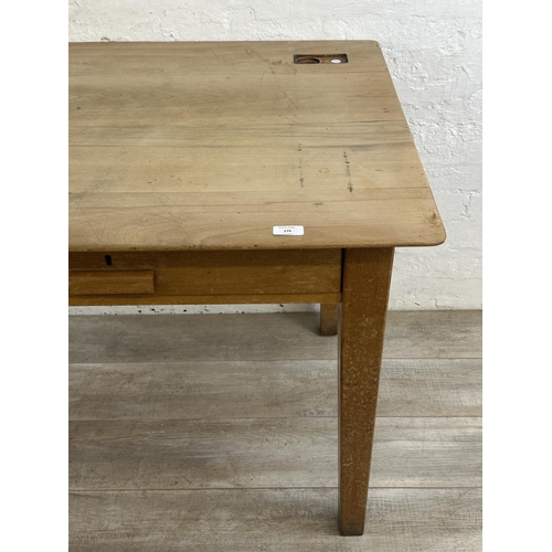 176 - A mid 20th century beech two drawer school desk - approx. 77cm high x 153cm wide x 77cm deep