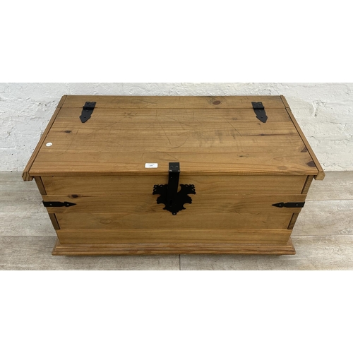 177 - A Mexican pine and black metal blanket box - approx. 46cm high x 92cm wide x 46cm deep