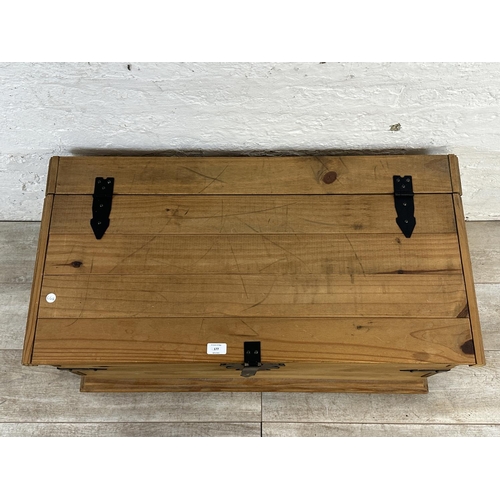 177 - A Mexican pine and black metal blanket box - approx. 46cm high x 92cm wide x 46cm deep