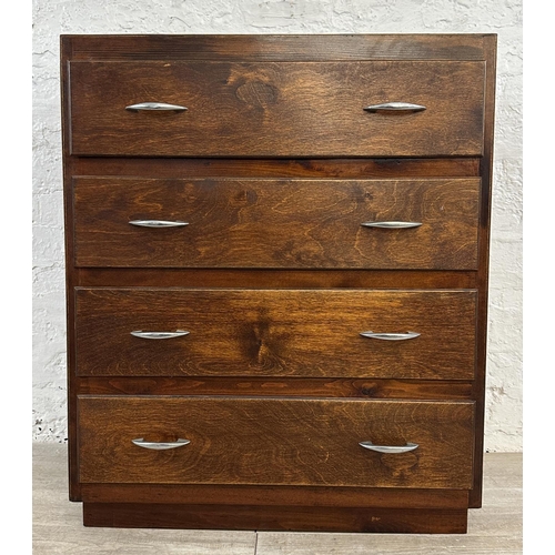 184 - A mid 20th century stained plywood chest of drawers - approx. 82cm high x 69cm wide x 40cm deep