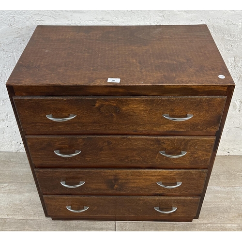 184 - A mid 20th century stained plywood chest of drawers - approx. 82cm high x 69cm wide x 40cm deep