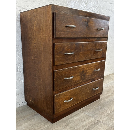 184 - A mid 20th century stained plywood chest of drawers - approx. 82cm high x 69cm wide x 40cm deep