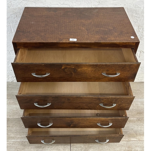 184 - A mid 20th century stained plywood chest of drawers - approx. 82cm high x 69cm wide x 40cm deep