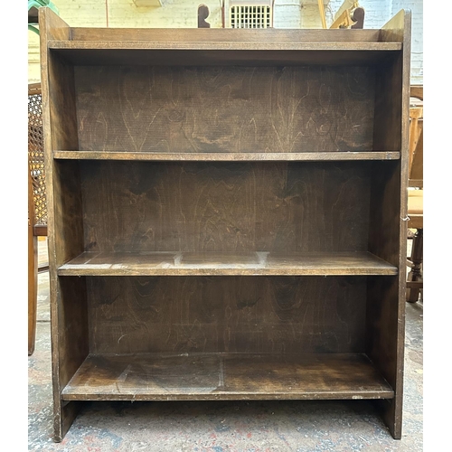 185 - A mid 20th century beech four tier bookcase - approx. 91cm high x 76cm wide x 22cm deep