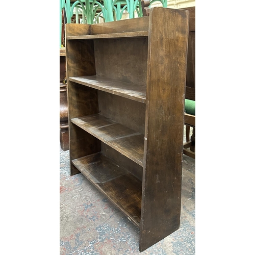 185 - A mid 20th century beech four tier bookcase - approx. 91cm high x 76cm wide x 22cm deep