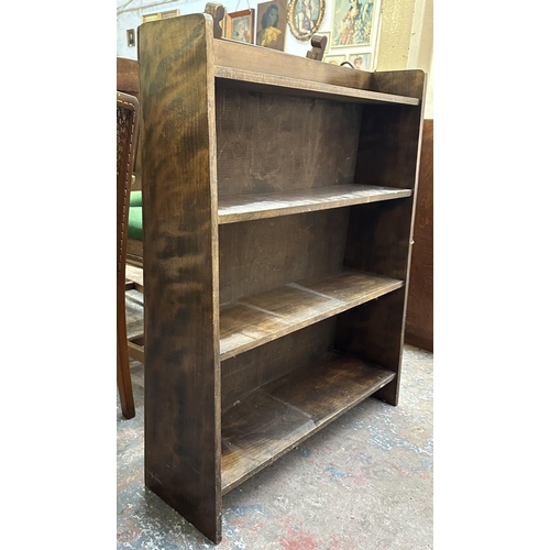 185 - A mid 20th century beech four tier bookcase - approx. 91cm high x 76cm wide x 22cm deep