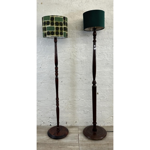 187 - Two stained beech standard lamps - approx. 159cm high including shade