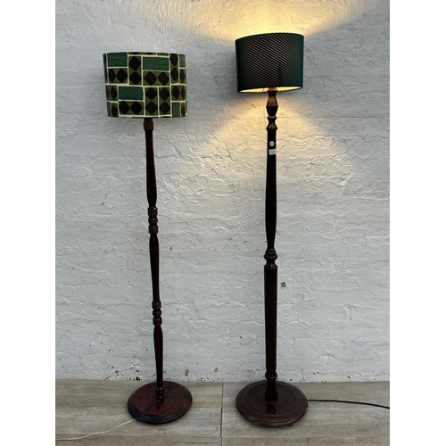 187 - Two stained beech standard lamps - approx. 159cm high including shade