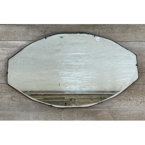 21 - Five mid 20th century bevelled edge wall mirrors, one gilt framed and four frameless - largest appro... 