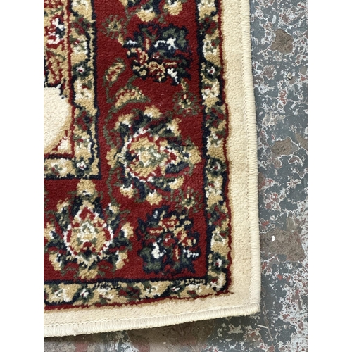 30 - Two Egyptian Carrera 100% polypropylene rugs - approx. 170cm x 120cm