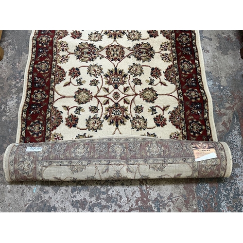 30 - Two Egyptian Carrera 100% polypropylene rugs - approx. 170cm x 120cm