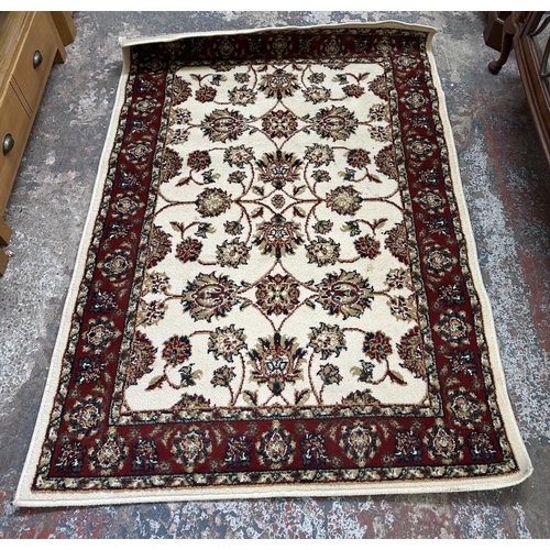 30 - Two Egyptian Carrera 100% polypropylene rugs - approx. 170cm x 120cm