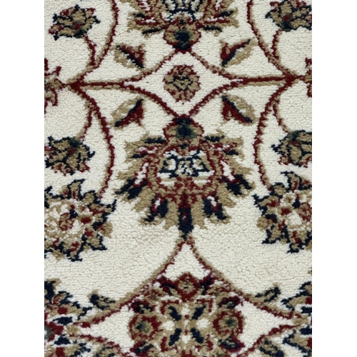 30 - Two Egyptian Carrera 100% polypropylene rugs - approx. 170cm x 120cm