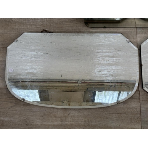 31 - Three mid 20th century Art Deco style frameless bevelled edge wall hanging mirrors - largest approx.... 