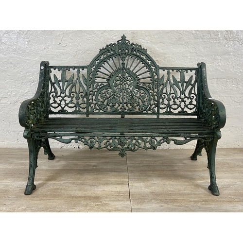 A Victorian Pierce of Wexford green painted cast iron garden bench - approx. 98cm high x 120cm wide x 63cm deep