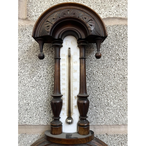 35 - Two late 19th/early 20th century barometers, one German mahogany cased and one oak cased aneroid - l... 