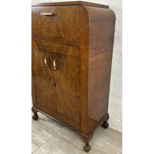 36 - An Art Deco walnut cocktail cabinet - approx. 120cm high x 74cm wide x 38.5cm deep