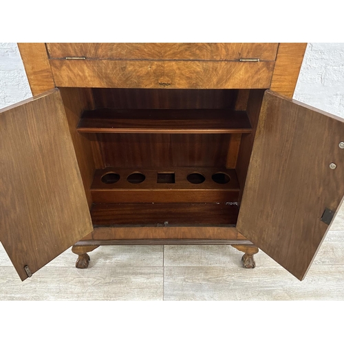 36 - An Art Deco walnut cocktail cabinet - approx. 120cm high x 74cm wide x 38.5cm deep