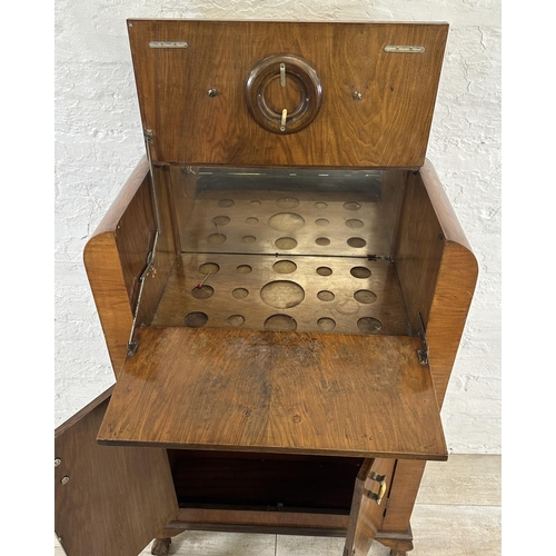 36 - An Art Deco walnut cocktail cabinet - approx. 120cm high x 74cm wide x 38.5cm deep