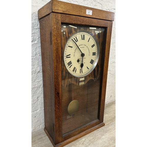 37 - An early 20th century The Gledhill-Brook Time Recorders Ltd oak cased time recorder converted wall c... 