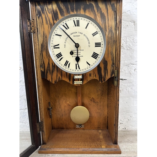 37 - An early 20th century The Gledhill-Brook Time Recorders Ltd oak cased time recorder converted wall c... 