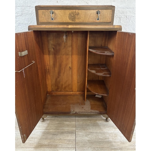 38 - An Art Deco walnut double door tallboy/gentlemen's wardrobe - approx. 128cm high x 84cm wide x 44cm ... 