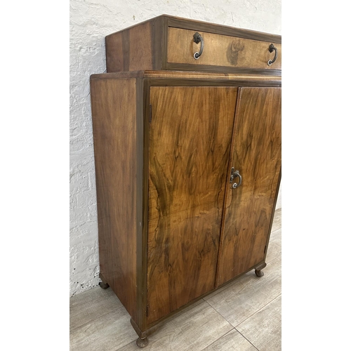 38 - An Art Deco walnut double door tallboy/gentlemen's wardrobe - approx. 128cm high x 84cm wide x 44cm ... 