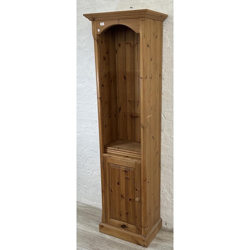 39 - A pine free standing bookcase - approx. 119cm high x 58cm wide x 37cm deep