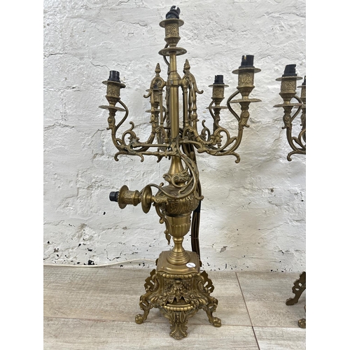 4 - A pair of Rococo style brass five branch table lamps - approx. 63cm high