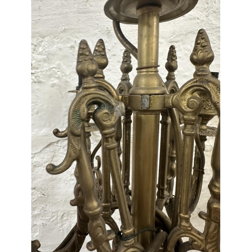 4 - A pair of Rococo style brass five branch table lamps - approx. 63cm high