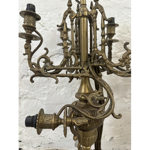 4 - A pair of Rococo style brass five branch table lamps - approx. 63cm high