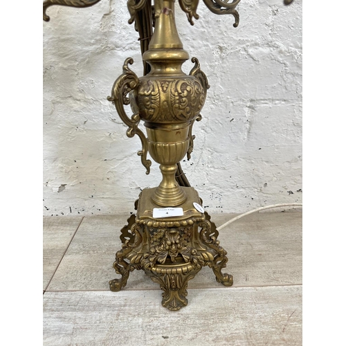 4 - A pair of Rococo style brass five branch table lamps - approx. 63cm high