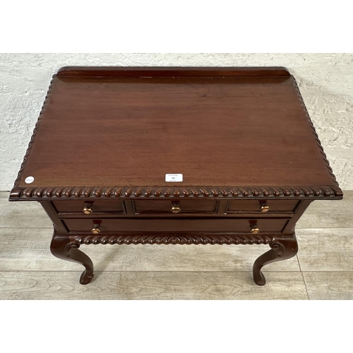 42 - A French Louis XV style carved mahogany side table - approx. 72cm high x 76cm wide x 45cm deep