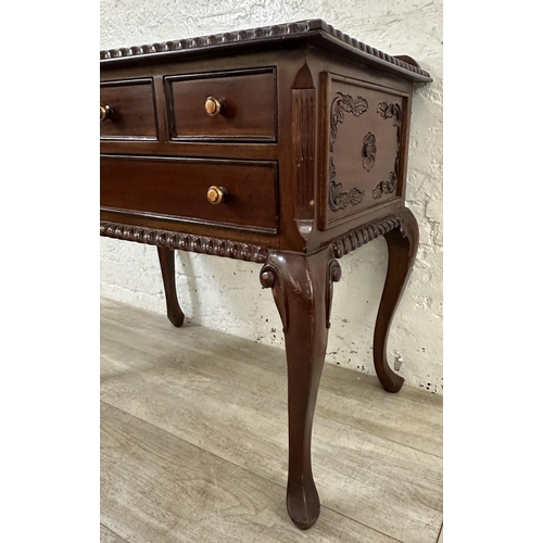 42 - A French Louis XV style carved mahogany side table - approx. 72cm high x 76cm wide x 45cm deep