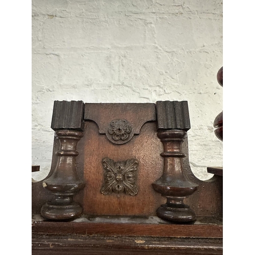 43 - A late 19th/early 20th century walnut cased chiming wall clock with pendulum and key - approx. 85cm ... 